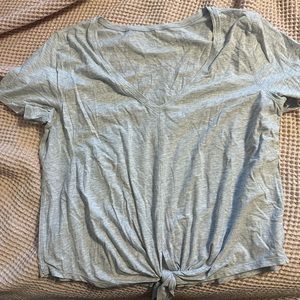 Good condition lululemon grey short sleeve shirt with tie front